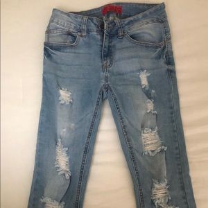 Light blue wax jean ripped  ( cut @ the bottom)